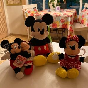 Mickey Mouse 15 inches stuffed animal. Minnie mouse 10 inches,& gift huggers.8”